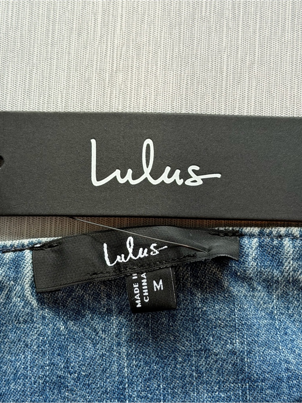 Lulus Charmed Aura Light Wash Denim Tie-Strap Bubble-Hem Mini Dress Size M NWT - Picture 11 of 11